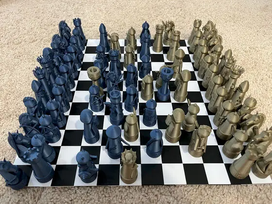 The whole battlefield at a glance — deep blue against gold across the checkered field.